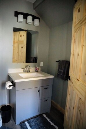 Bathroom with modern fixtures and walk in shower