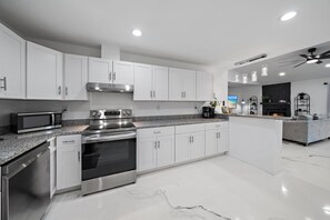 This modern kitchen has everything that you need for a week in luxury!