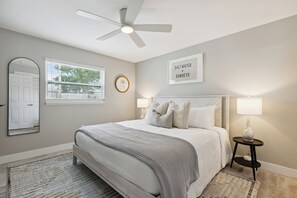 A serene master bedroom with a plush king-size bed for comfort