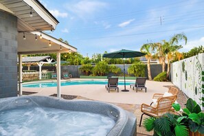 Take in the poolside views from the hot tub – the perfect combination of relaxation and luxury.
