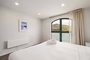 Bedroom two with lower balcony access (super king bed which can split into singles)