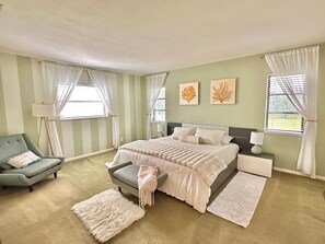 The Florida Room
Master Bedroom with Private Bathroom, walk in closet.