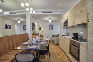 CUISINE OUVERTE AVEC SALLE A MANGER