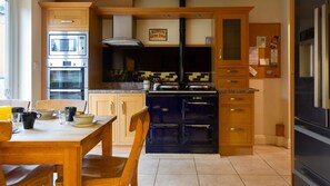 The traditional kitchen has a wonderful AGA available in the winter months