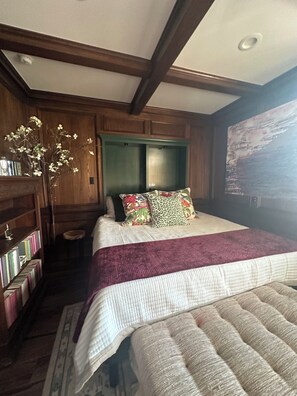 King bedroom one with private walk in shower Wall mount vessel sink.
