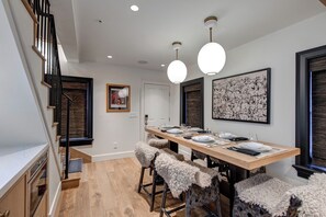 A dining table with seating for 6 guests.
