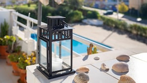 Cozy details and a touch of nature—perfect for a peaceful escape with a poolside view.
#RelaxingVibes #BalconyMoments #SunnyEscape