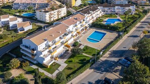 A stunning aerial view of your perfect getaway—modern comfort, a relaxing pool, and a charming surroundings. 
#ScenicStay #PoolsideLiving #RelaxAndUnwind