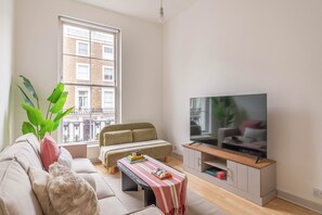 65 inch smart TV with all your favourite streaming apps and cable channels.
