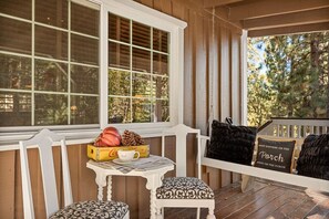 Large front porch with rockers and swing for morning coffees and bird watching.
