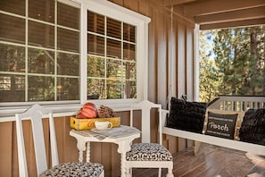 Large front porch with rockers and swing for morning coffees and bird watching.