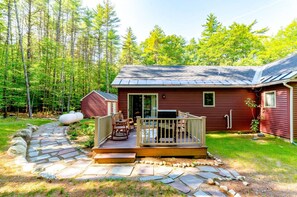 Relax on the deck and enjoy the peaceful views from our home.