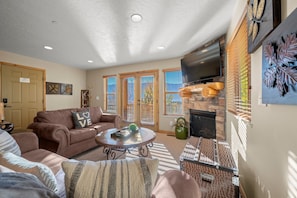 There is easy access from the living room to the deck.