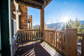 Enjoy the views of the mountains from the deck.