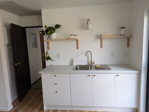 Kitchenette comes with 1 stove, airfrier, microwave, toaster, kettle, plunger