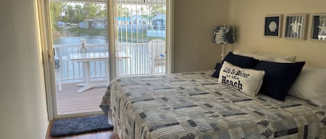 Master bedroom with closet organizer, looks out onto pond. Fabulous wildlife !