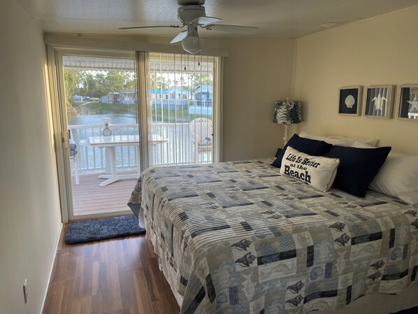 Master bedroom with closet organizer, looks out onto pond. Fabulous wildlife !