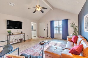Step into comfort and style! Our spacious living room is perfect for relaxing after a day of exploring, featuring cozy seating, plenty of natural light, and a modern vibe to make you feel right at home.
