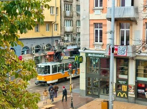 Soak up the city vibes from your private balcony overlooking Sofia’s most iconic boulevard. Don’t wait—book your stay today!