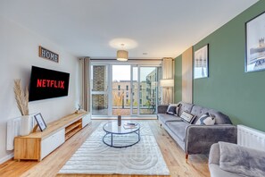 The living room has a 55'' Smart TV with Sky and Netflix subscriptions provided