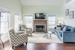 Relaxing living room w/ smart TV + wood burning fireplace