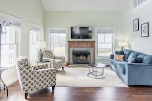 Relaxing living room w/ smart TV + wood burning fireplace