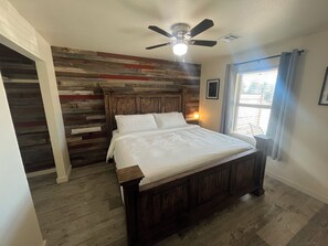 King bed, ceiling fan, Smart TV, Room Darkening blinds, bed side charging