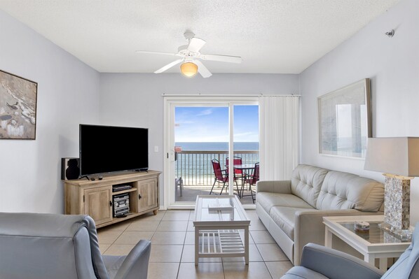 Leather sleeper sofa, 2 leather recliners, Wall mounted Smart TV and balcony access with a breathtaking view