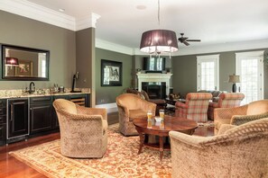 Conversation chairs next to the wet bar