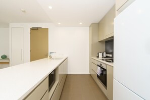 The modern kitchen is equipped with appliances and a Nespresso machine, though you will need to supply your own pods.