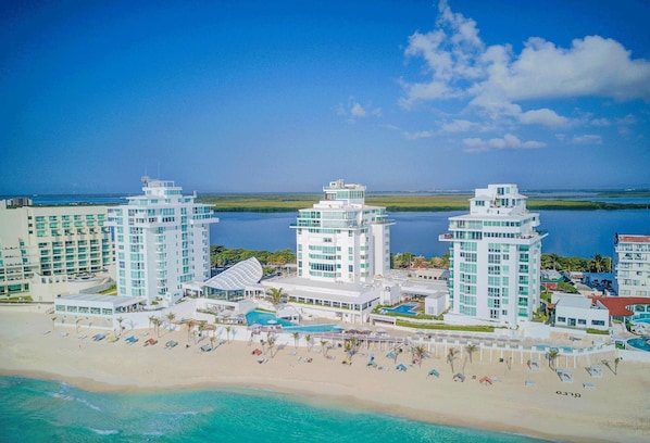 Aerial view of the resort, Oleo Cancun Playa. Penthouse Combo #312 is located in the North tower, right, on the top floor, 7th. Between both units, you have the entire Ocean Facing side of the top two floors of the tower.