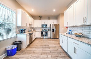 Fully equipped kitchen with modern appliances