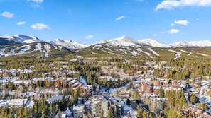 Drone shot directly above Sundowner II looking onto Breckenridge Ski Resort (Snowflake Lift is a 5 minute walk and is visible in front-center)