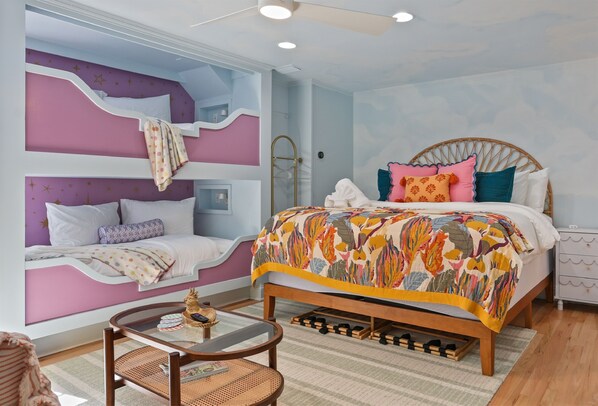 Where whimsy meets comfort ✨🌈 From dreamy bunk beds to bold patterns and cozy textures, this playful retreat is perfect for families and kids-at-heart