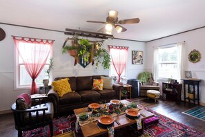Turn the large slab coffee table into a floor seat dining experience with our comfy floor pillows!