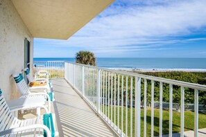 Spacious balcony with comfy seating to soak in the ocean breeze