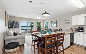 East Side dining & living room area with beautiful views of the Lagoon.