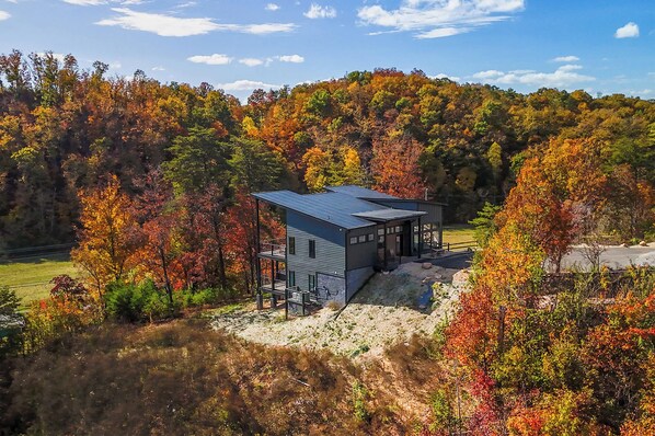 Experience the perfect blend of modern elegance and rustic charm in this brand new elevated cabin located in the breathtaking Great Smoky Mountains!
