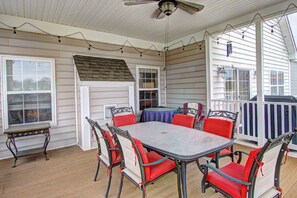 Dine on the screened-in porch.