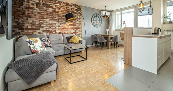 Living room, with large double sofa bed, terrace with a view.