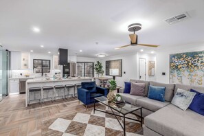 Open concept living, kicthen and dining with plenty of space to relax and unwind