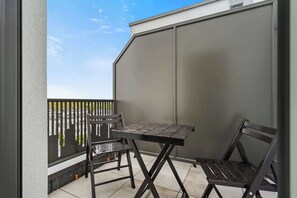Inviting Balcony Space – Ideal spot for a morning coffee or evening relaxation with stunning outdoor views.