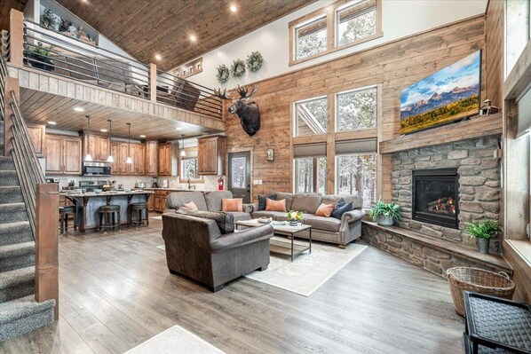Open floorplan combining the living room and kitchen area making sure everyone is included.