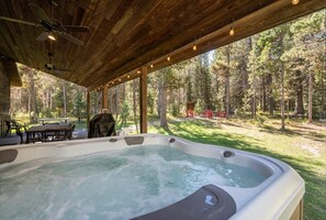 Relax after the day's adventures in the roomy hot tub.