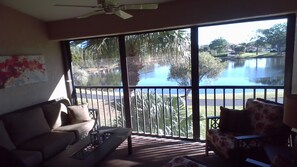 Lanai with lake view, walking paths, gardens, car wash...