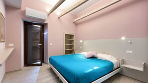 Comfortable bedroom with access to the balcony