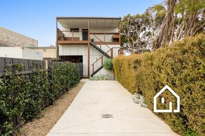 This property is accessed via two flights of steep stairs (as pictured).  