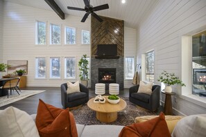 Bright and inviting living room featuring a sleeper sofa that comfortably accommodates two additional guests for a relaxing stay!