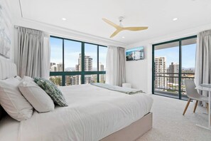 It opens to a second compact balcony, allowing the cooling breezes to filter through.