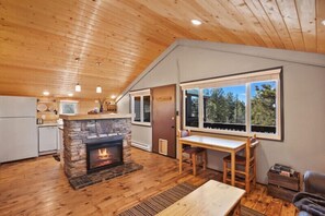 Wake up to peace + pine trees in this 70s mountain cabin